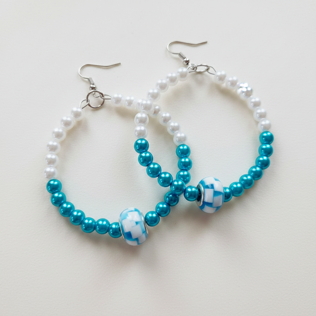Still Water Hoop Earrings on Soft White Background